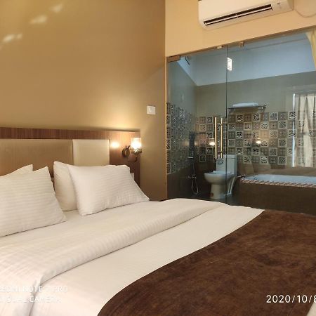 The Pearl Hotel Puri Bagian luar foto