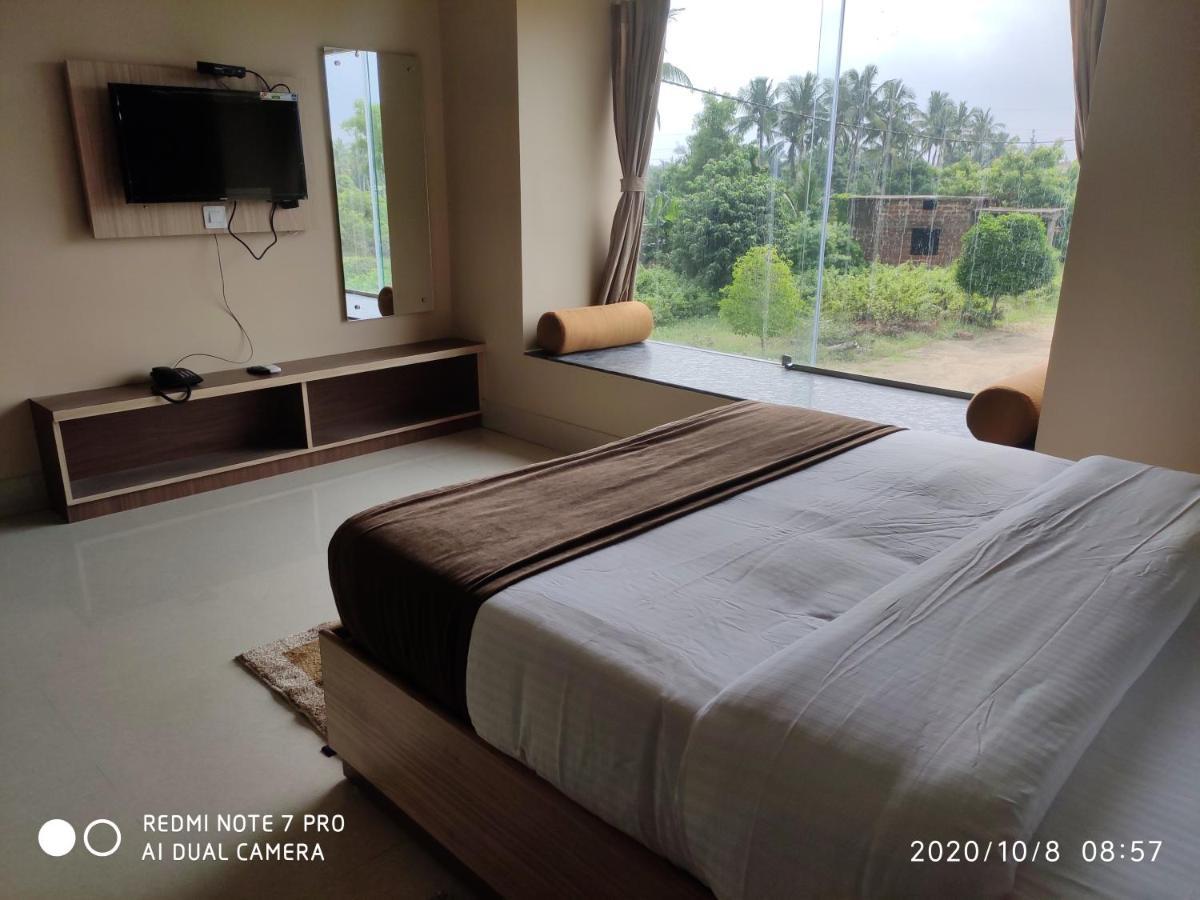 The Pearl Hotel Puri Bagian luar foto