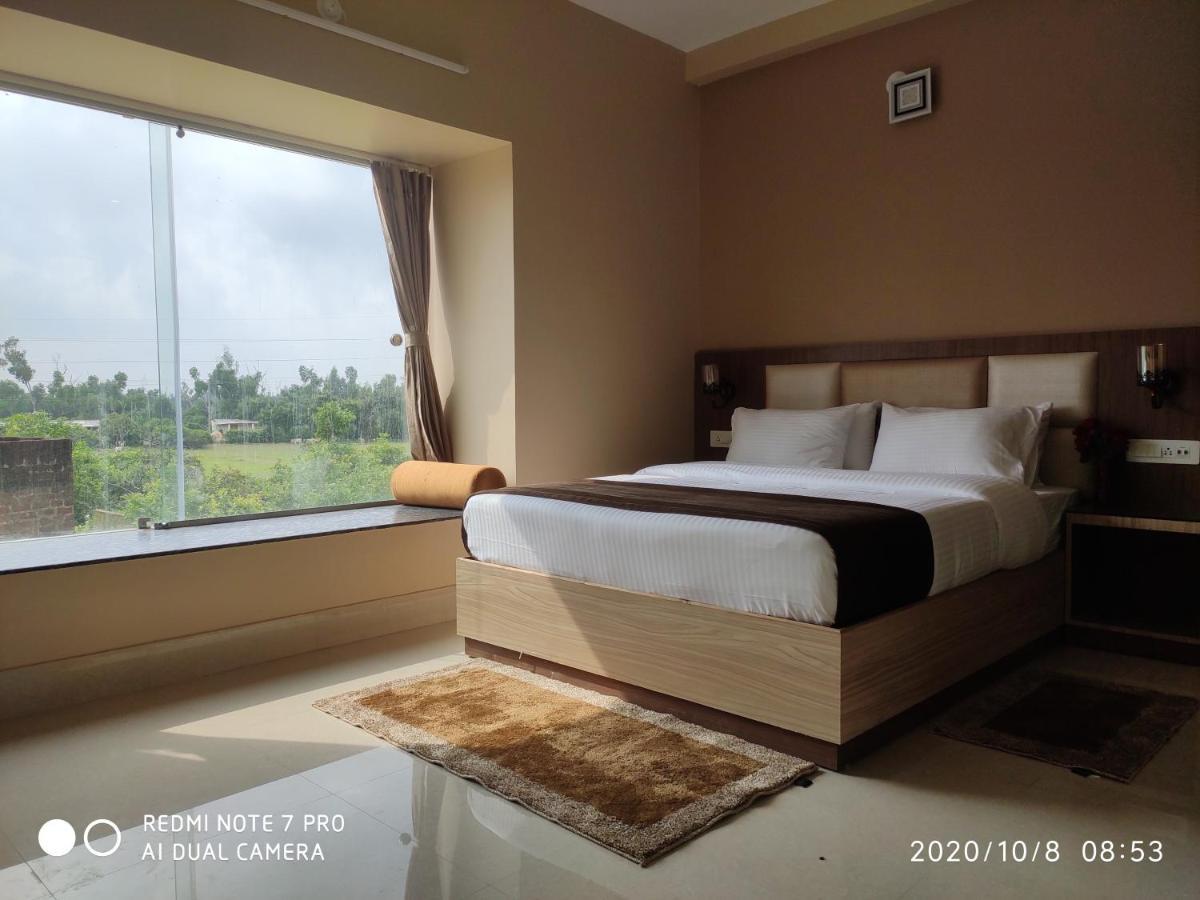 The Pearl Hotel Puri Bagian luar foto