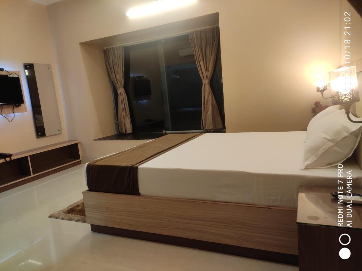 The Pearl Hotel Puri Bagian luar foto