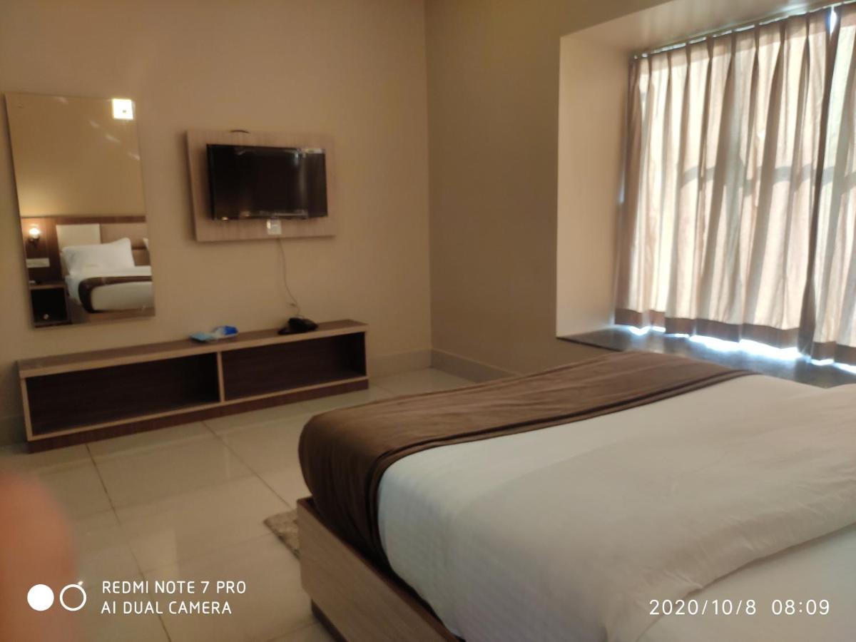 The Pearl Hotel Puri Bagian luar foto