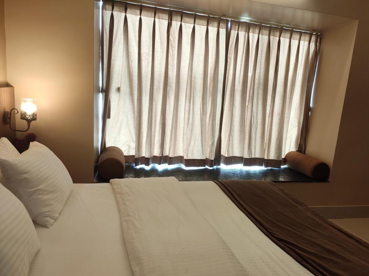 The Pearl Hotel Puri Bagian luar foto