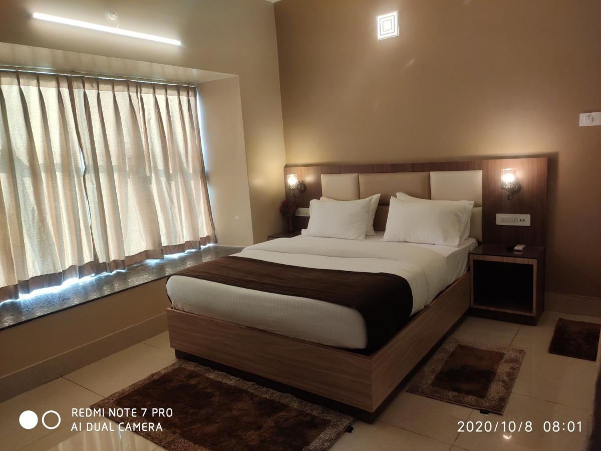 The Pearl Hotel Puri Bagian luar foto