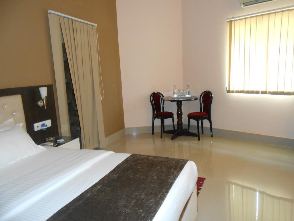 The Pearl Hotel Puri Bagian luar foto