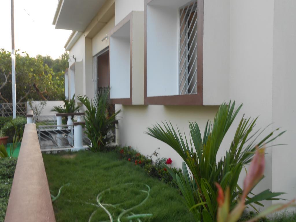 The Pearl Hotel Puri Bagian luar foto