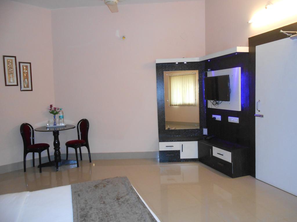 The Pearl Hotel Puri Bagian luar foto