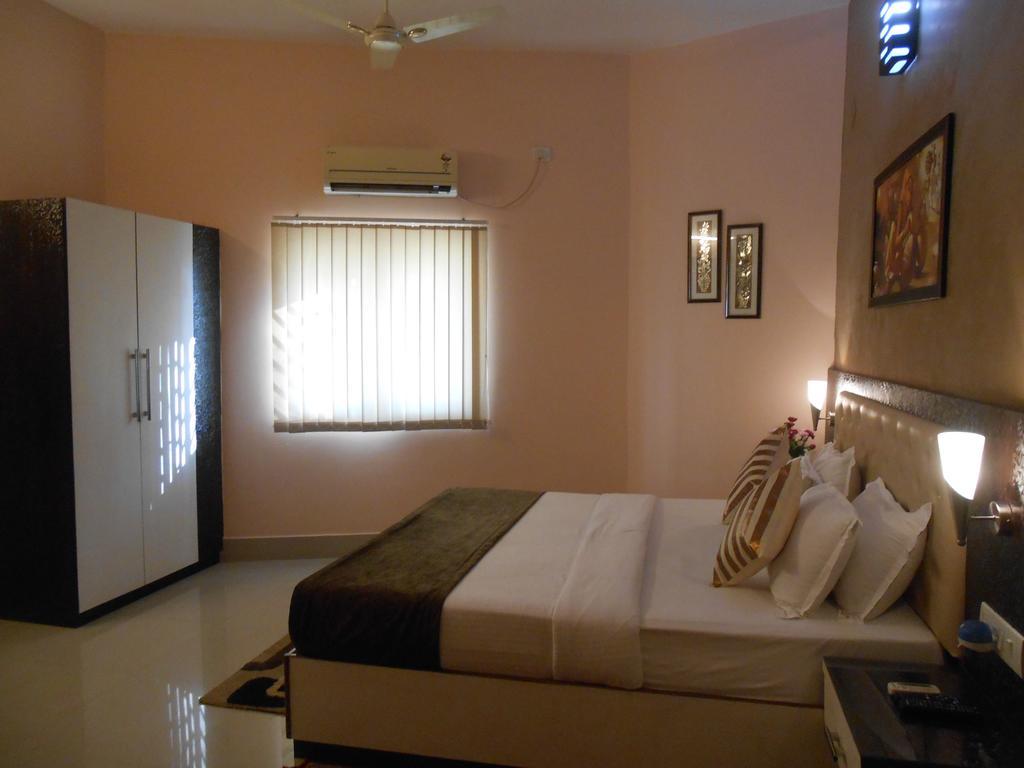 The Pearl Hotel Puri Bagian luar foto