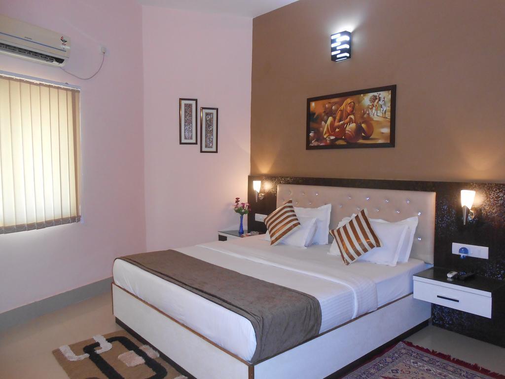The Pearl Hotel Puri Bagian luar foto