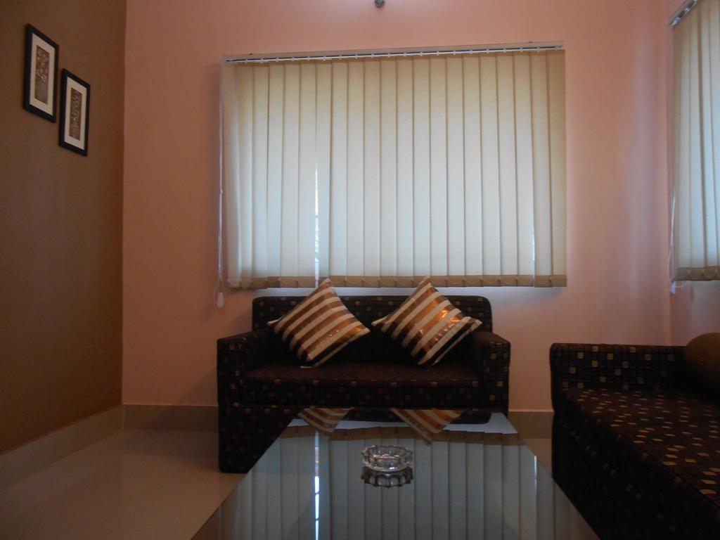 The Pearl Hotel Puri Bagian luar foto